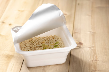 Add hot water and eat instant cup yakisobaの写真素材