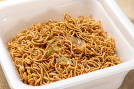 Add hot water and eat instant cup yakisobaの写真素材