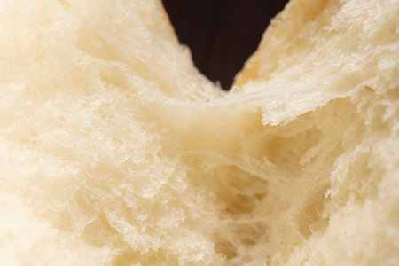Shred freshly baked bread by handの写真素材