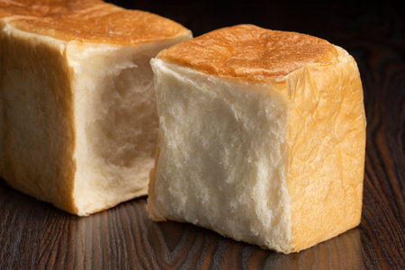 Shred freshly baked bread by handの写真素材