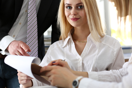 Beautiful smiling businesswoman portrait at workplace look in camera. White collar worker at workspace, exchange market, job offer, irs, certified public accountant, internal Revenue officer conceptの写真素材
