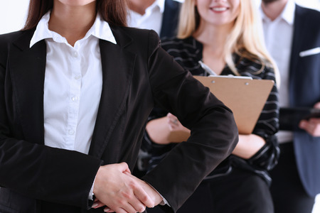 Group of business people women and men businessman and businesswoman successful and satisfied gathered together education receiving congratulations sincerely diploma courses qualificationの写真素材