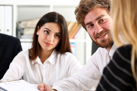 Group of people sit in office deliberate on problem portrait. White collar talk and listen, idea discuss, profit review, sale market debate, train, lawyer document study, finance adviser job conceptの写真素材