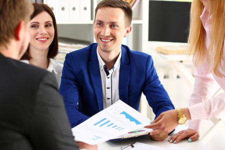 Group of people sit in office deliberate on problem portrait. White collar talk and listen, idea discuss, profit review, sale market debate, train, lawyer document study, finance adviser job conceptの写真素材