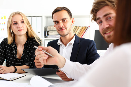 Group of people sit in office deliberate on problem portrait. White collar talk and listen, idea discuss, profit review, sale market debate, train, lawyer document study, finance adviser job conceptの写真素材