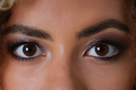 Eye of a black woman shot large macroの写真素材