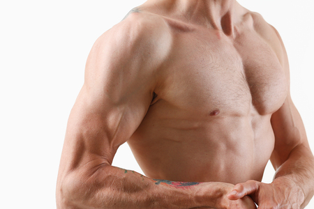 Strong men's press thanks to diet and constant trainingの写真素材