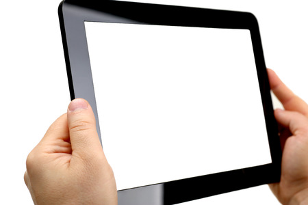 Man hoding black tablet frame in hand isolated on white closeup. Can insert an image image your text for the concept or project development of mobile applications, their advertising for mobile devicesの写真素材