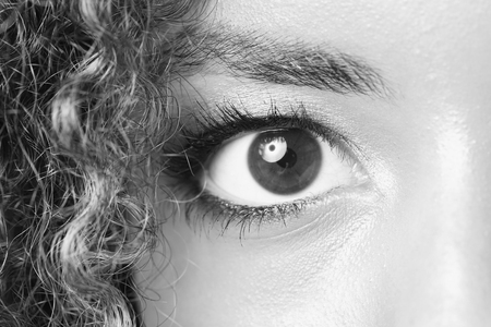 Eye of a black woman shot large macroの写真素材