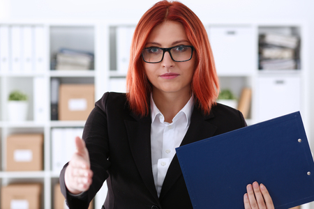 Businesswoman offer hand to shake as helloの写真素材