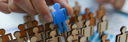 Male arm move small human figureの写真素材