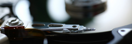 Hard drive from computer or laptop lies on the tableの写真素材