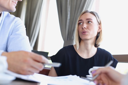 Business woman explains the policy of enterprise