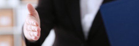 Businesswoman offer hand to shake as helloの写真素材