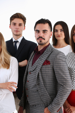 Group of smiling people stand in officeの写真素材