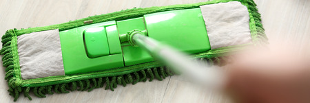 Green plastic mop