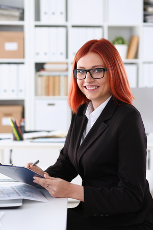 Businesswoman in the workplace in the officeの写真素材