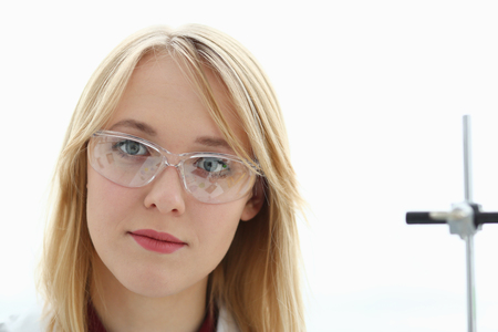 Smiling beautiful technician woman portraitの写真素材