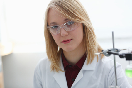 Smiling beautiful technician woman portraitの写真素材