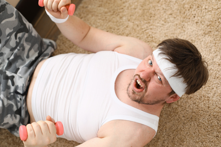 A young handsome thick overweight man doingの写真素材