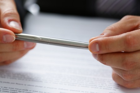 Male arm in suit and tie fill form clippedの写真素材