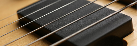 Classic shape wooden electric guitar with rosewood neck