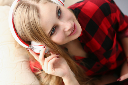 woman listen music headphones dream relaxの写真素材