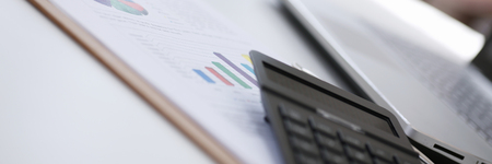 calculator lie on paper document diagramの写真素材