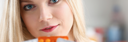 Female doctor hand holding pack of differentの写真素材