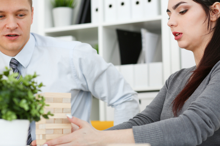 Businessman plays in a strategy of block gameの写真素材