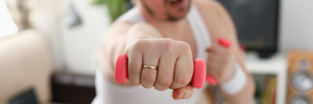 Young attractive man engaged in fitnessの写真素材