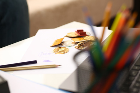 Golden ethereum coin lying at table closeup