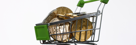 Basket from supermarket with coins crypto currencyの写真素材