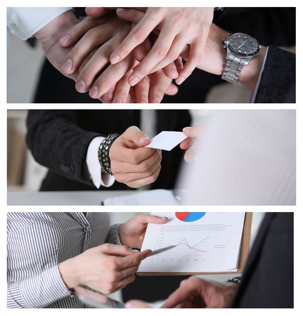 business partneers putting hands one on oneの写真素材