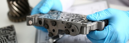 The auto repair service repairman in automatic