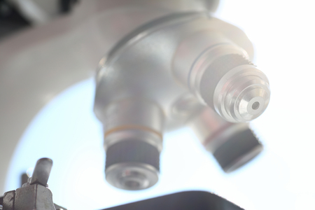 The head microscope on the blurred background.の写真素材