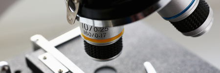 The head microscope on the background of