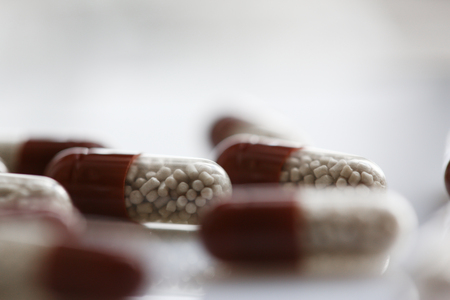 Tablets scattered on the table of theの写真素材