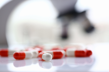 Tablets scattered on the table of theの写真素材