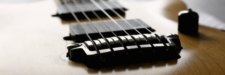 Classic shape wooden electric guitar with rosewood neck