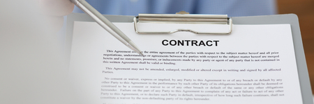 Female arm in suit offer contract form on clipboard padの写真素材