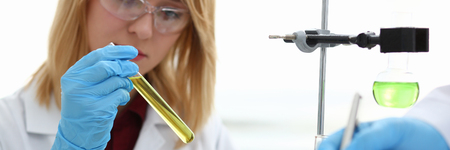 Technician hold in arms in protective glovesの写真素材