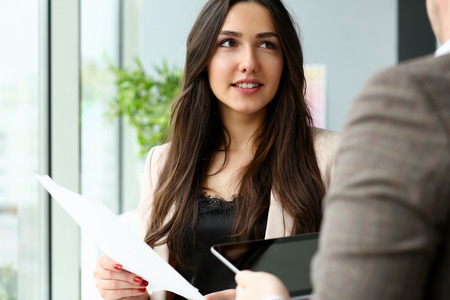 Group of people hold in arms financial papersの写真素材