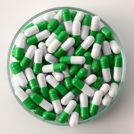 Tablets scattered on the table of theの写真素材
