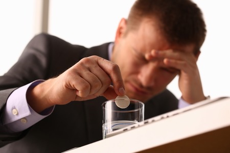 Adult male businessman hold tablet onの写真素材