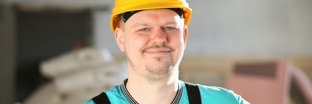 Portrait of young attractive man in work