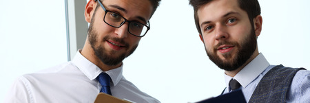 Group of modern businesspeople in office debate on financial issueの写真素材