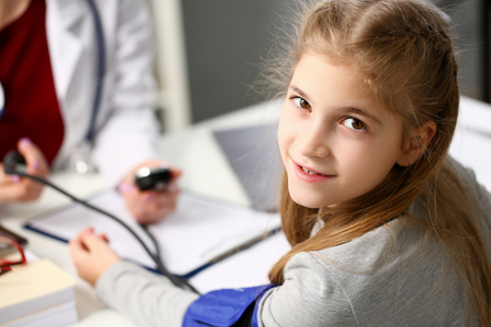 Female doctor arms make medic procedure closeupの写真素材