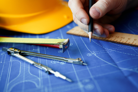 Male hand holding pencil in hand.の写真素材