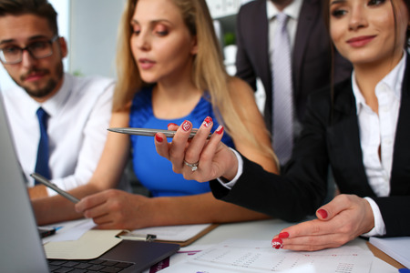 Group of people in office use laptop pc closeupの写真素材